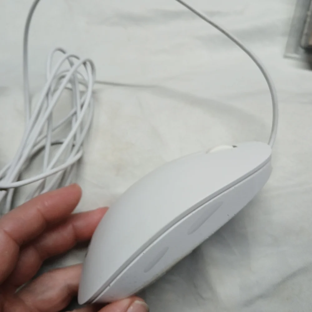 HP wired mouse, potentially model number M54852-001 or HSA-D004K.